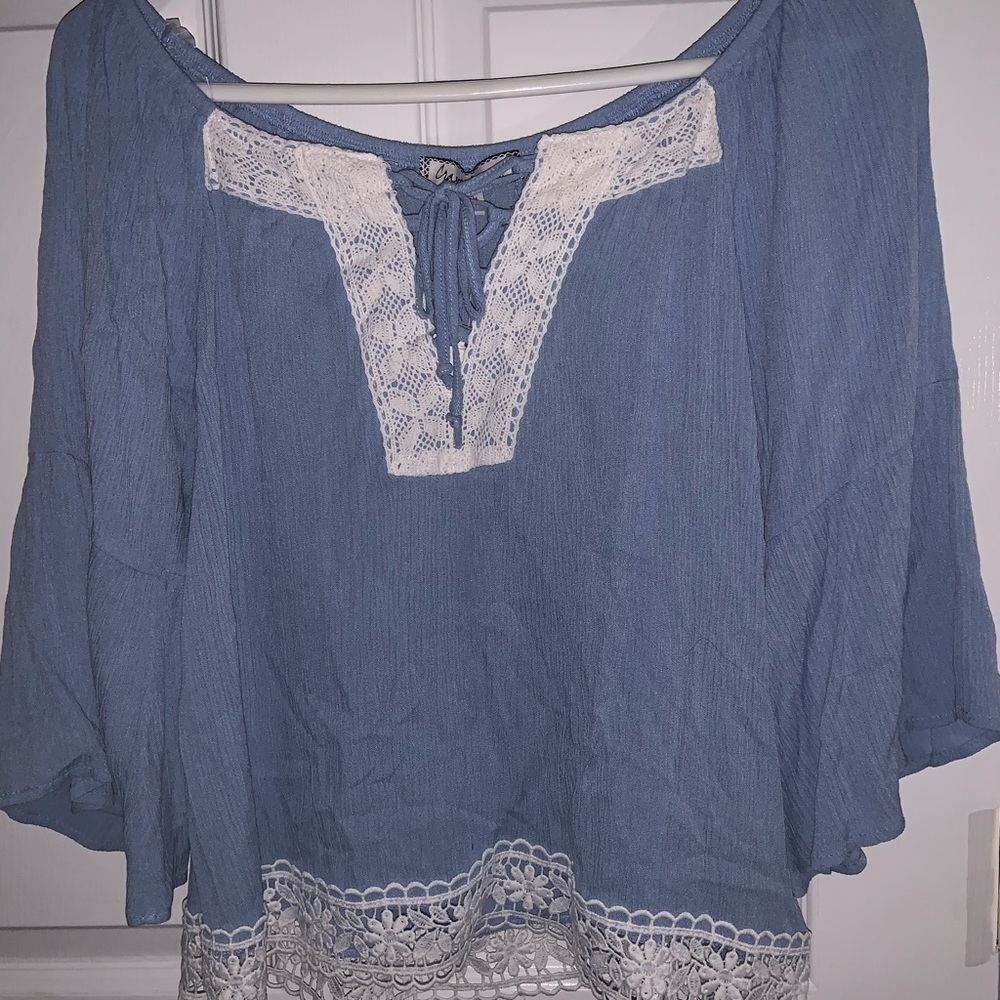 Blue Blouse with White Lace Trimming